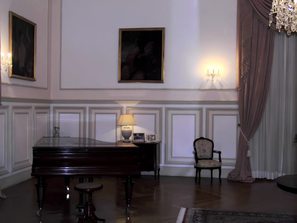 a piano in a classy looking room